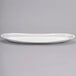 A white oval porcelain tray.