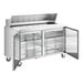 A stainless steel True refrigerated sandwich prep table with two doors.