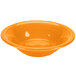 A close up of a Fiesta Tangerine china cereal bowl.