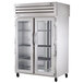 A True pass-through refrigerator with glass doors.
