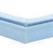 A close up of a blue plastic corner.