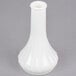 A white Cambro bud vase with a curved bottom.