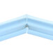 A blue plastic corner for a Delfield 1702007 equivalent drawer gasket.