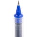 A blue Uni-Ball Vision pen with a gray cap.