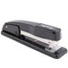 A black Swingline stapler with a silver metal handle.