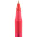 A close-up of a red Bic round stic pen with a gold tip.