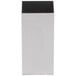 A white rectangular object with a black top and black border.