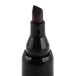 A close-up of a black Universal chisel tip permanent marker.