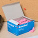 A box of Paper Mate Arrowhead eraser caps.