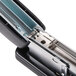 A Bostitch black desktop stapler with a metal handle and clip.