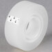 A white roll of Universal Clear Write-On Invisible Tape with black arrows on the label.