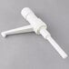 A white plastic Cambro condiment dispenser kit with long white tubes.