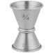 An American Metalcraft stainless steel Japanese style jigger with numbers on a white surface.