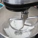 A mixer mixing Golden Barrel Creme Fondant mix in a bowl.