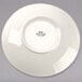 A white Tuxton pasta/salad bowl with a black rim and black text on it.