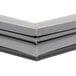 A gray plastic corner of a Traulsen magnetic door gasket.