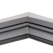 A gray corner piece for a Traulsen magnetic door gasket.