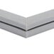 A gray metal corner of a Traulsen magnetic door gasket.
