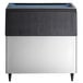 A stainless steel Hoshizaki ice storage bin with a blue lid.