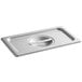 A Vigor stainless steel lid on a metal tray.