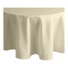 An Intedge ivory round tablecloth on a table.