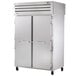 A True reach-in refrigerator with a white door and a handle.