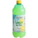 A green bottle of Natural Strength Lemon Juice with a green lid.