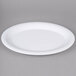 A white oval Carlisle melamine platter.