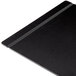 A black Cal-Mil menu board with black flex bands on a table.