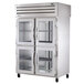 A True pass-through refrigerator with glass doors.