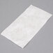 A white paper towel with a floral design.