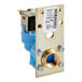 A blue and gold Scotsman inlet solenoid valve with a brass nut.
