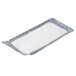 A white and gray rectangular absorbent pad.