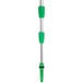 A Unger green and silver telescopic pole with white ErgoTec locking cone.