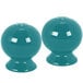 A pair of turquoise Fiesta salt and pepper shakers.