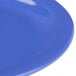 A close up of a blue Carlisle melamine plate.