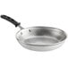 A Vollrath Wear-Ever aluminum frying pan with a black silicone handle.