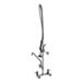 A chrome Equip by T&amp;S wall mounted pre-rinse faucet with hose and add-on faucet.