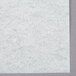 A white Hoffmaster Linen-Like paper guest towel with a gray floral pattern.