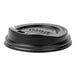 A black Eco-Products recycled content plastic lid on a table with a coffee cup lid.