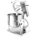 A Cleveland 12 gallon metal steam jacketed mixer kettle with a metal structure and lid.