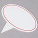 A white speech bubble with a red outline.