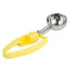 a yellow and silver scoop