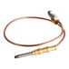 A copper and brass US Range thermocouple with a brass connector.
