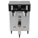 a coffee machine with two cups