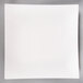 a white square plate with a grey background