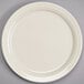 A Homer Laughlin ivory china plate with a narrow white rim.
