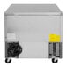 A stainless steel Turbo Air undercounter refrigerator with a power cord.