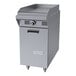 A stainless steel natural gas griddle attachment with a storage base and manual controls.