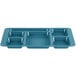 A teal plastic tray with six compartments.